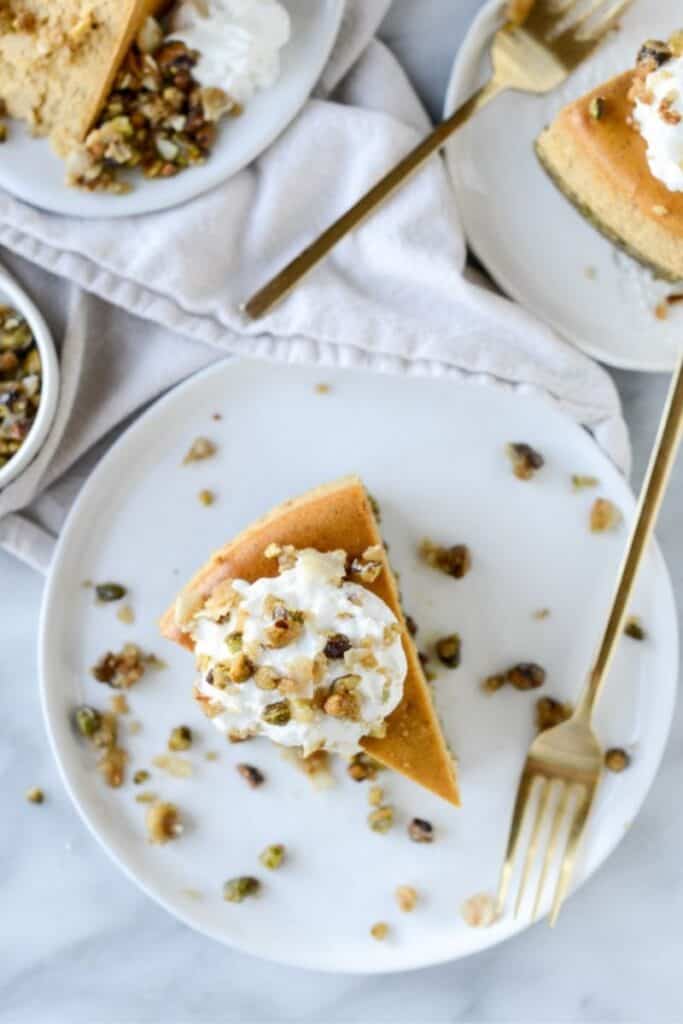 Brown Sugar Pumpkin Cheesecake with Pistachio Macaroon Crust by How Sweet Eats