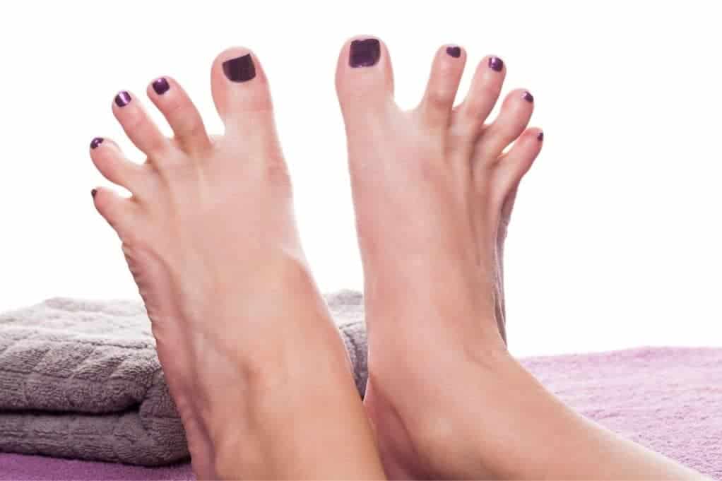 Woman's feet with the toes spread apart
