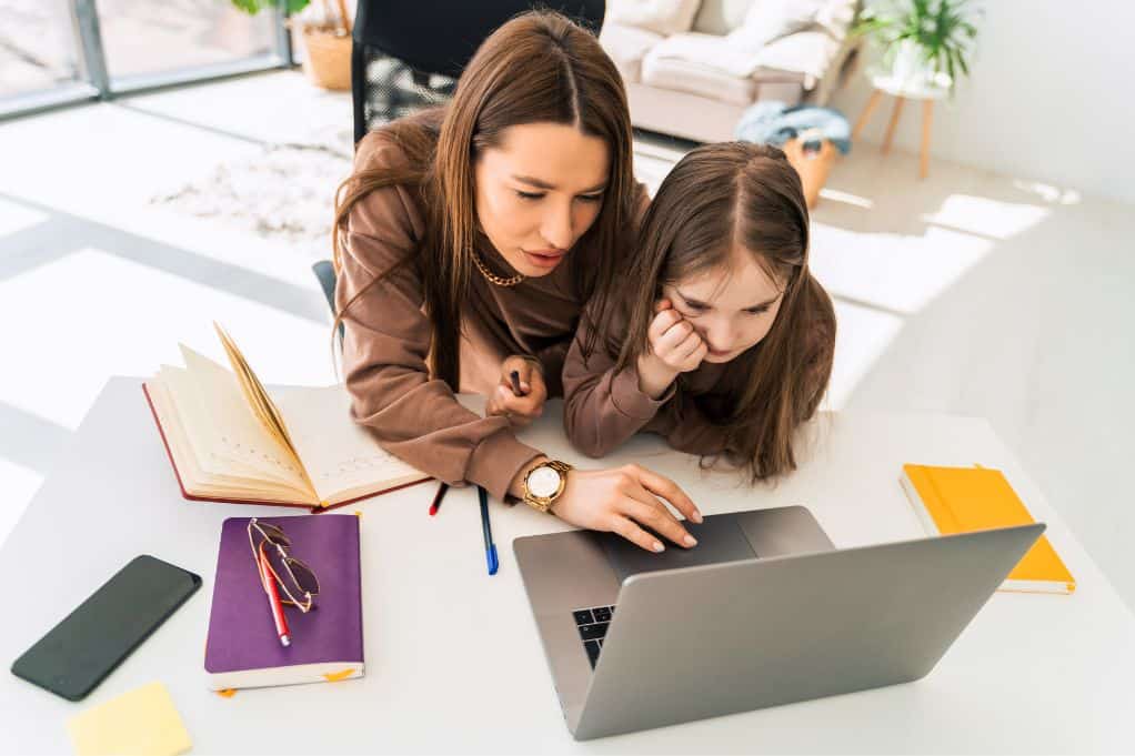 moms working with her child close by