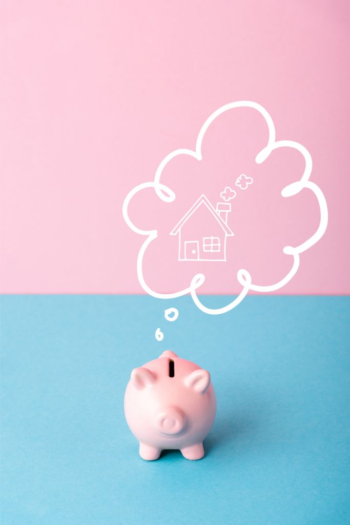 piggy bank thinking of a house inside a dream bubble