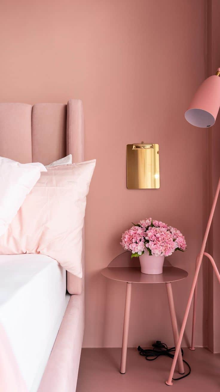 a dusty rose colored bedroom